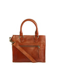 Chestnut leather handbag with a crossbody strap on a white background