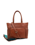 Brown leather handbag with a detachable strap on a white background