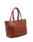 Brown leather handbag with a pocket on a white background