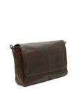 Brown leather messenger bag on a white background