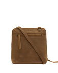 A brown suede crossbody bag with a matching leather strap, front zippered pocket, and a debossed 'CEMP' logo on the front, shown against a plain white background.