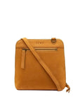A square-shaped tan suede crossbody bag with a front zippered pocket and a diagonal shoulder strap, shown against a plain white background.