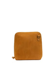 A small tan leather zip-around pouch with a top zipper and a small leather tab detail on the right side, shown against a plain white background.