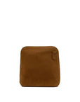 A brown suede pouch with rounded corners and a small leather tab detail on the top right, shown against a plain white background.