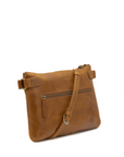 Brown leather handbag with a strap on a white background