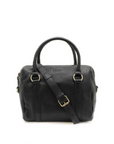 Black handbag with gold hardware on a white background