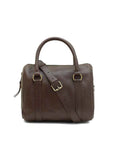 Brown leather duffel bag with a strap on a white background