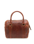 Brown leather handbag on a white background