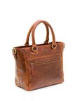 Brown leather handbag with gold accents on a white background