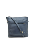 Blue leather crossbody bag on a white background