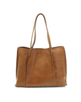 Brown leather tote bag on a white background