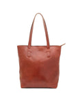 Brown leather tote bag on a white background