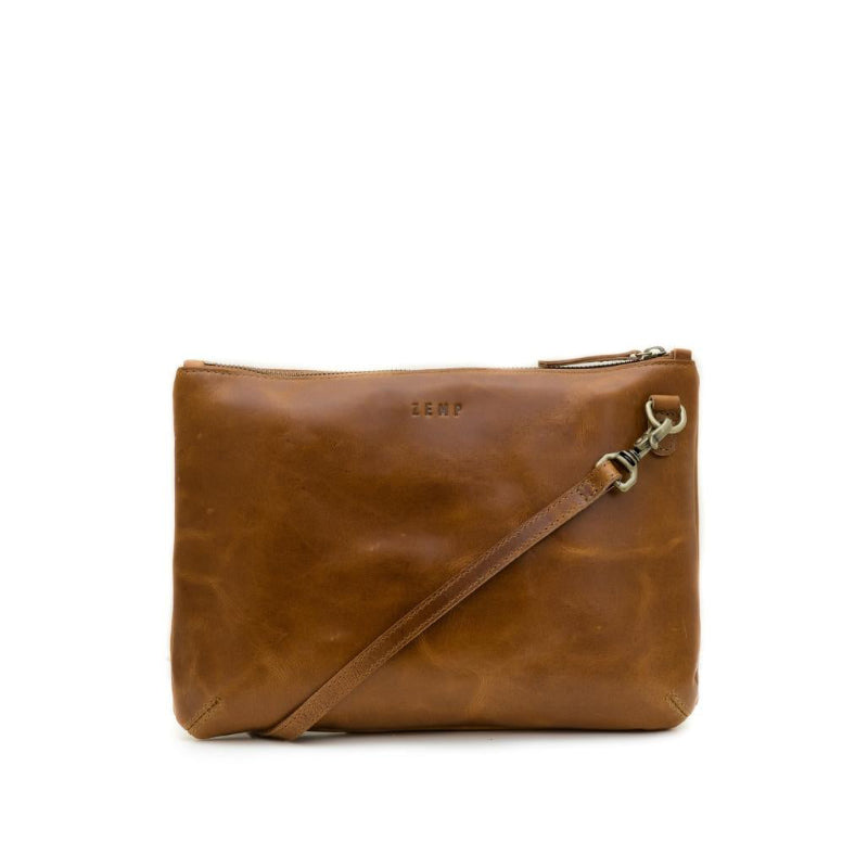 Brown leather clutch bag with a strap on a white background
