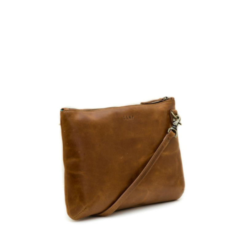 Brown leather crossbody bag on a white background