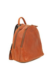 Orange leather backpack on a white background
