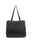 Black leather handbag with a shoulder strap on a white background