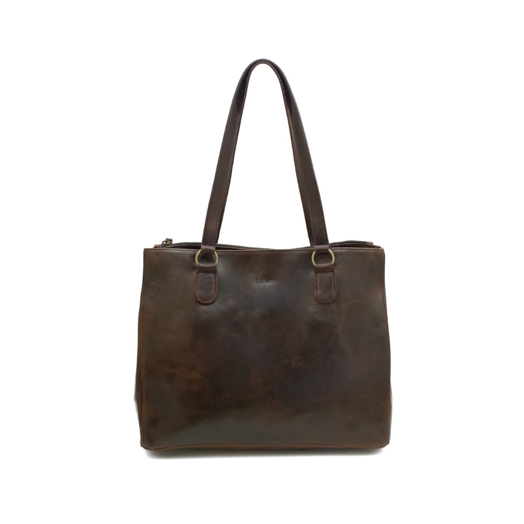 Brown leather handbag with a strap on a white background