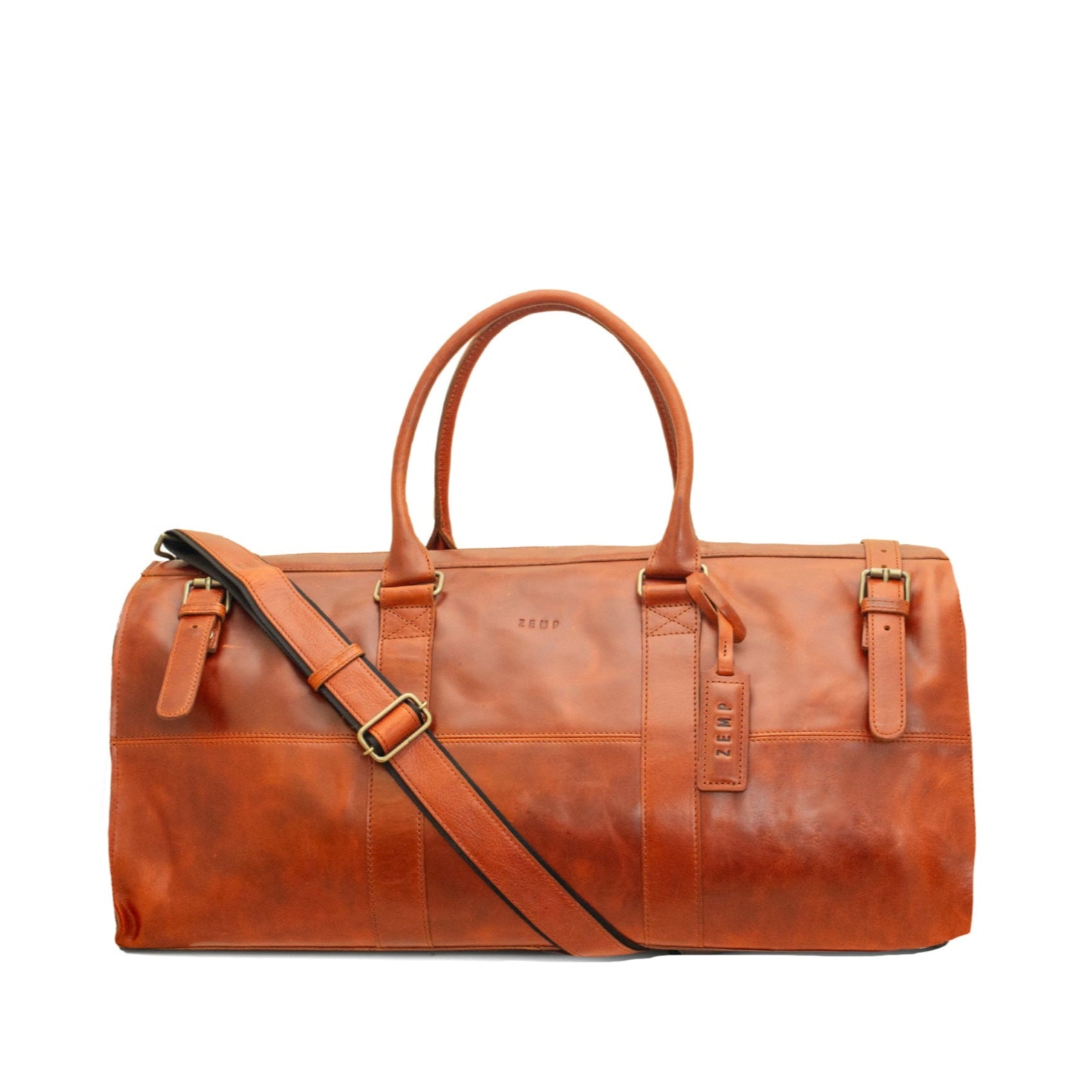 Brown leather duffel bag with a shoulder strap on a white background