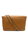 Tan leather messenger bag with a black strap on a white background
