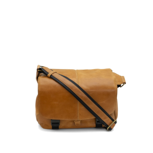 Brown leather messenger bag with black strap on a white background