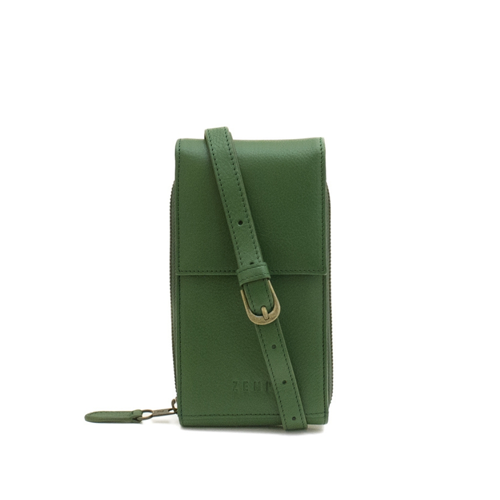 Green leather crossbody bag with a strap on a white background