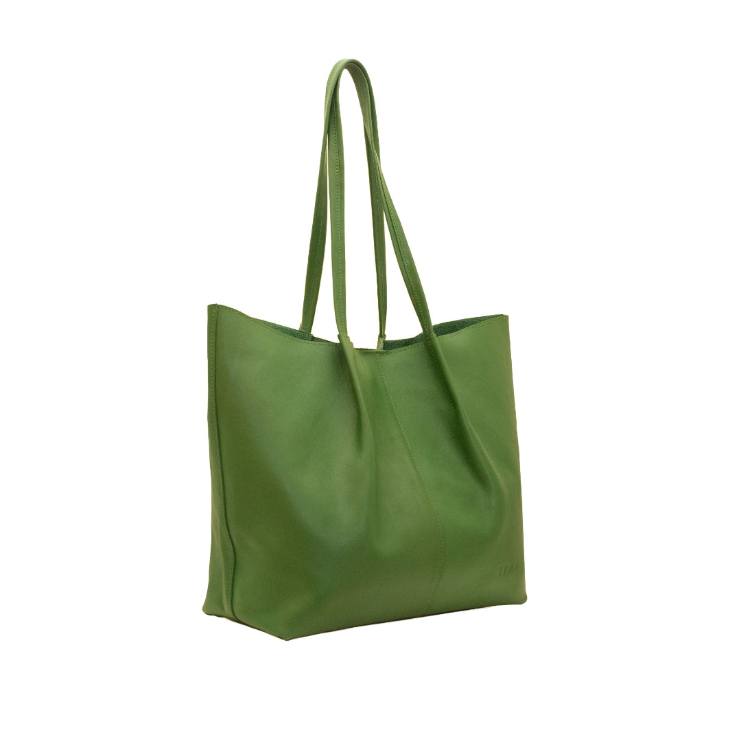 Green leather tote bag on a white background