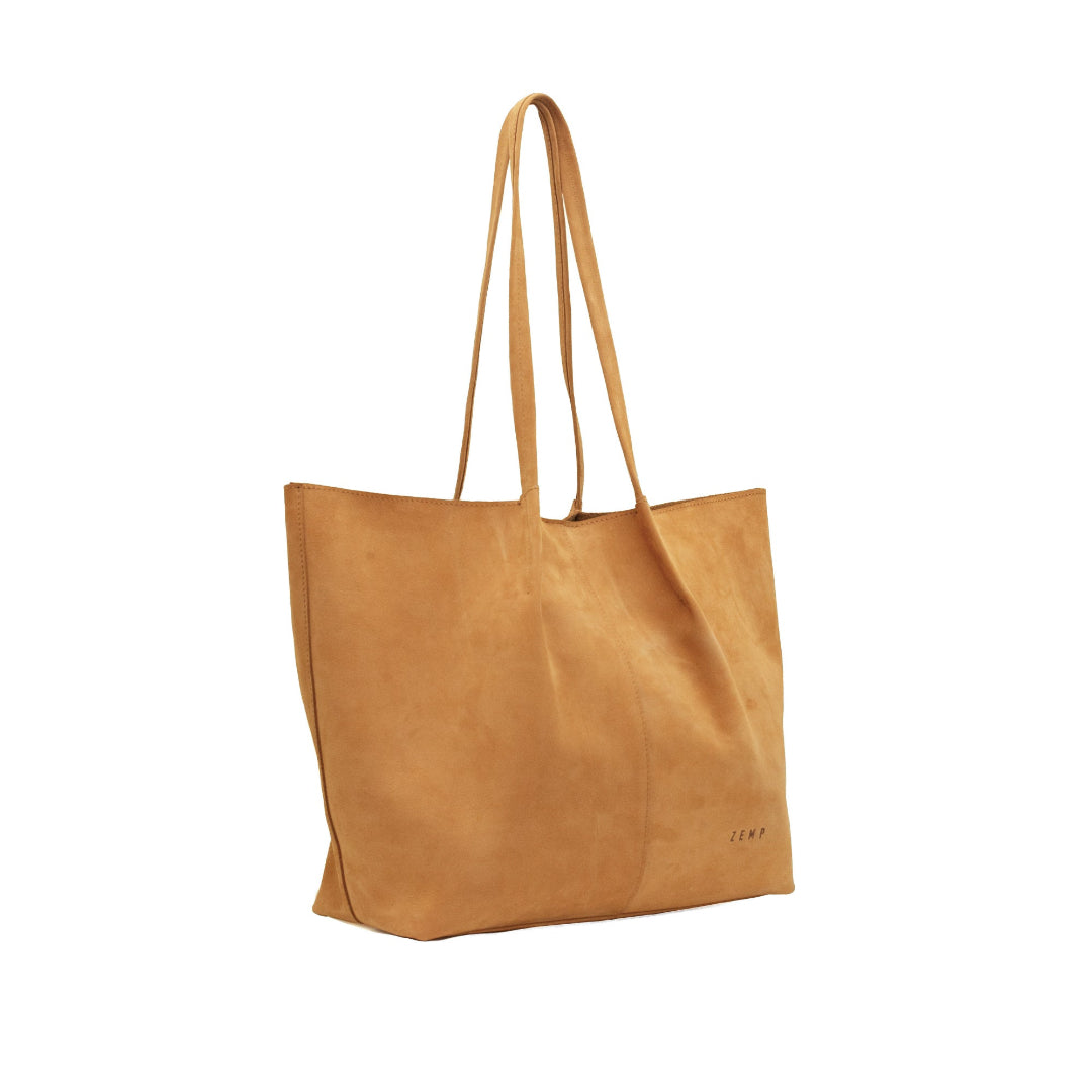 Camel leather tote bag on a white background