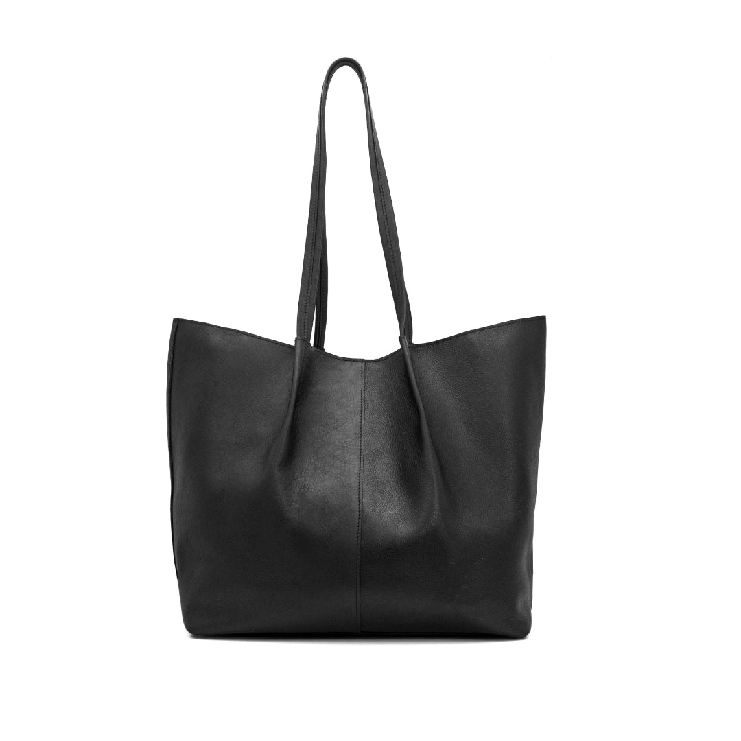 Black leather tote bag on a white background
