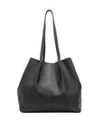 Black leather tote bag on a white background