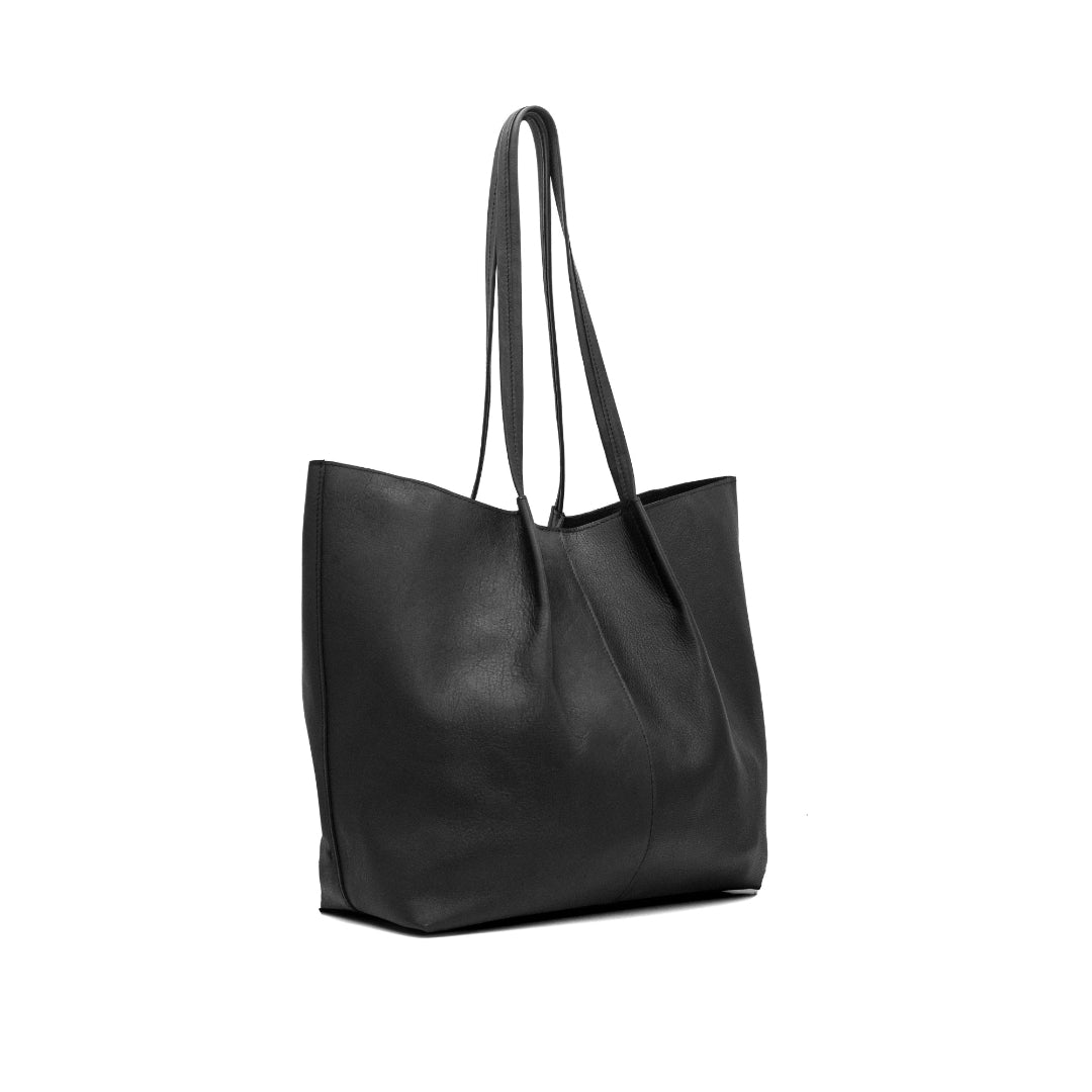 Black leather tote bag with shoulder straps on a white background