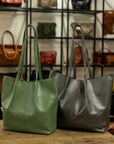 Estoril leather bag in forest green and black