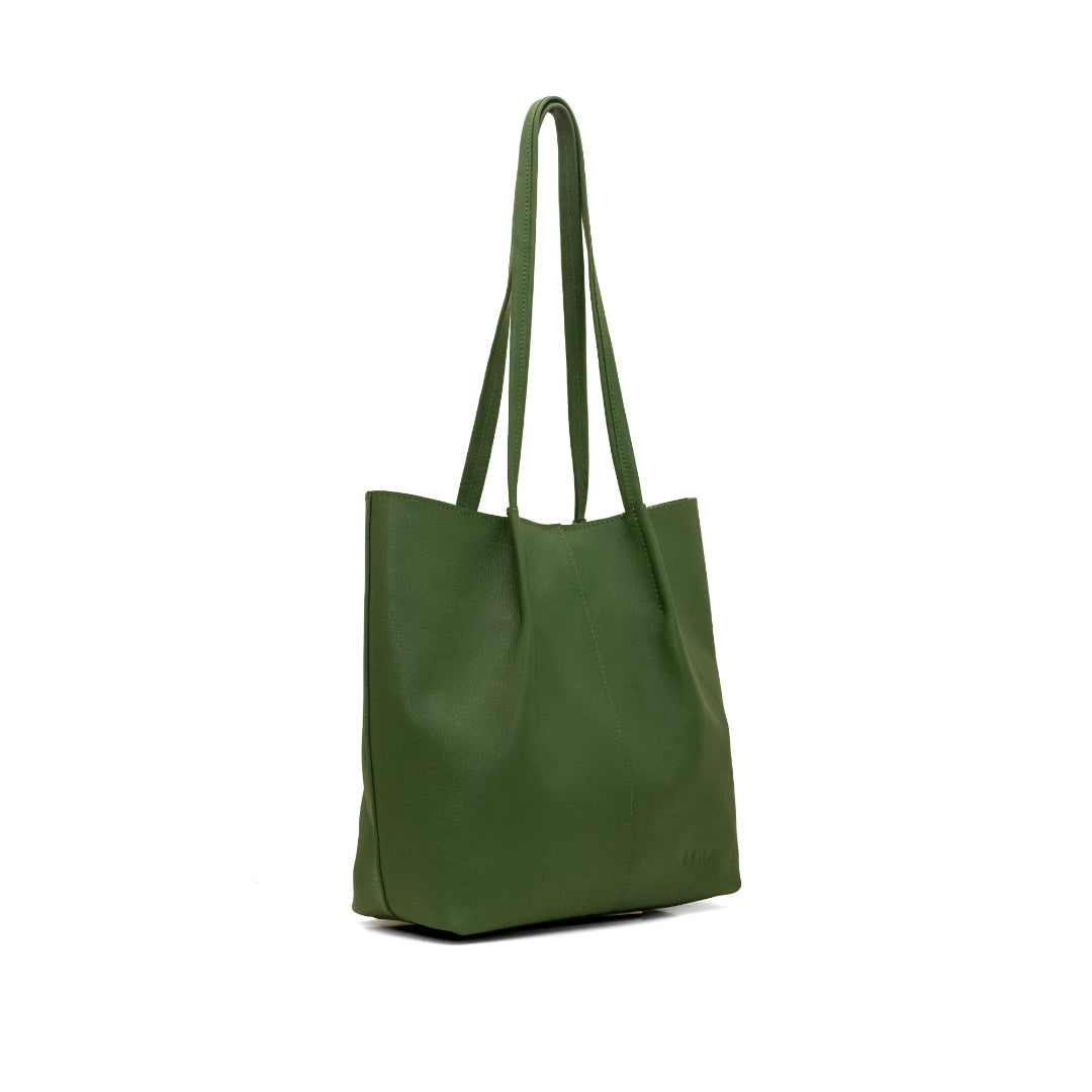 Green leather tote bag on a white background