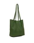 Green leather tote bag on a white background
