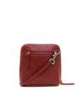 Red crossbody bag with a gold zipper on a white background