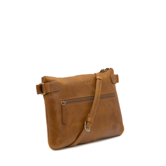 Brown leather handbag with a strap on a white background