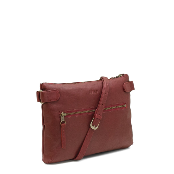 Red leather crossbody bag on a white background
