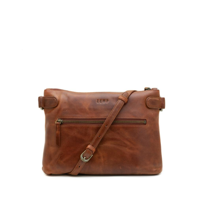Brown leather handbag with a strap on a white background