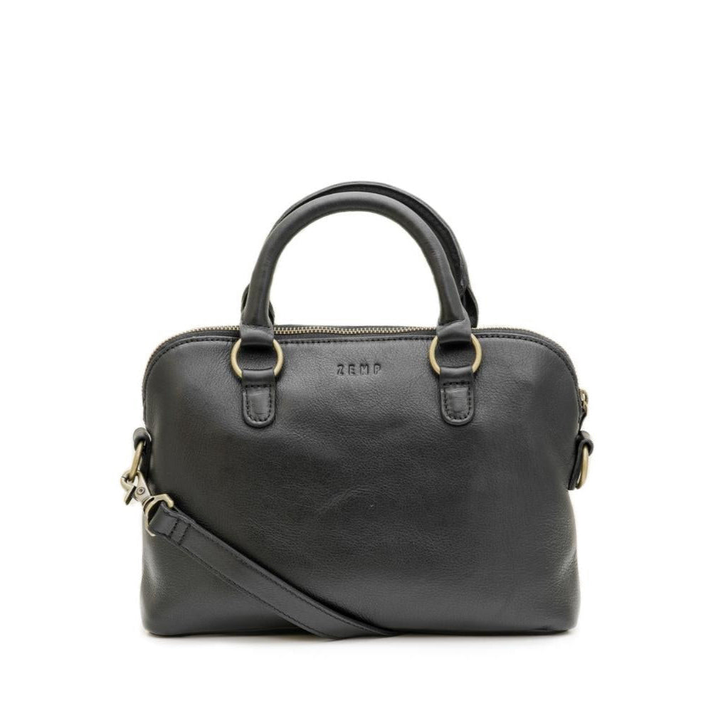 Black leather handbag with a shoulder strap on a white background