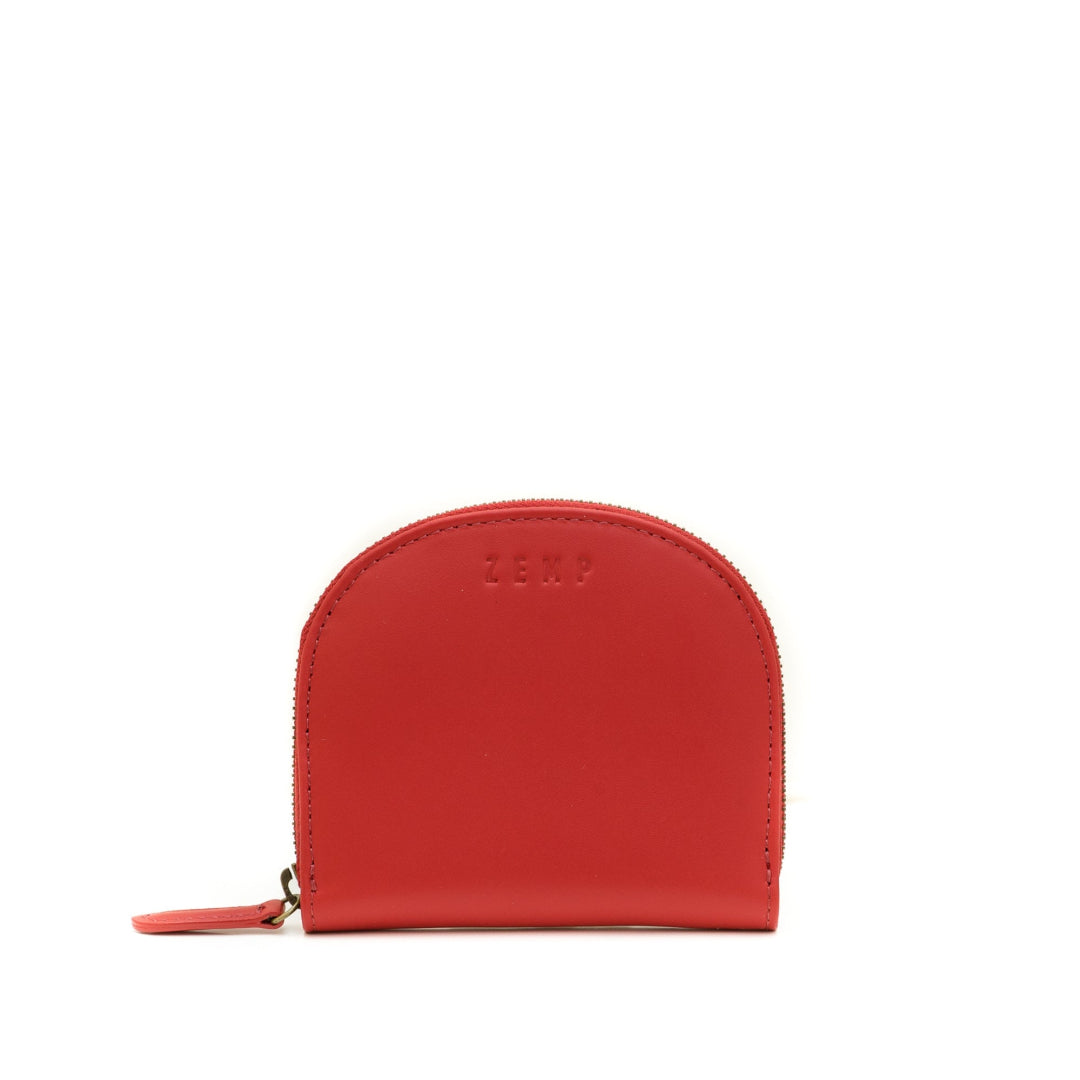 Coral wallet with 'Zemp' branding on a white background