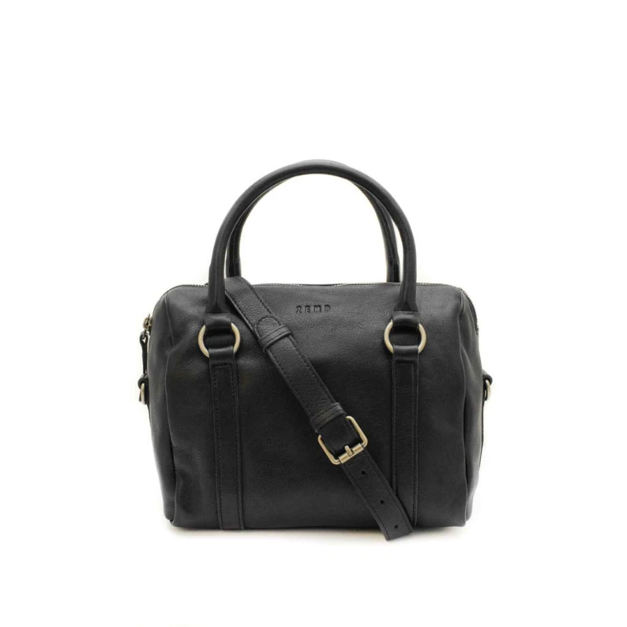 Black handbag with gold hardware on a white background