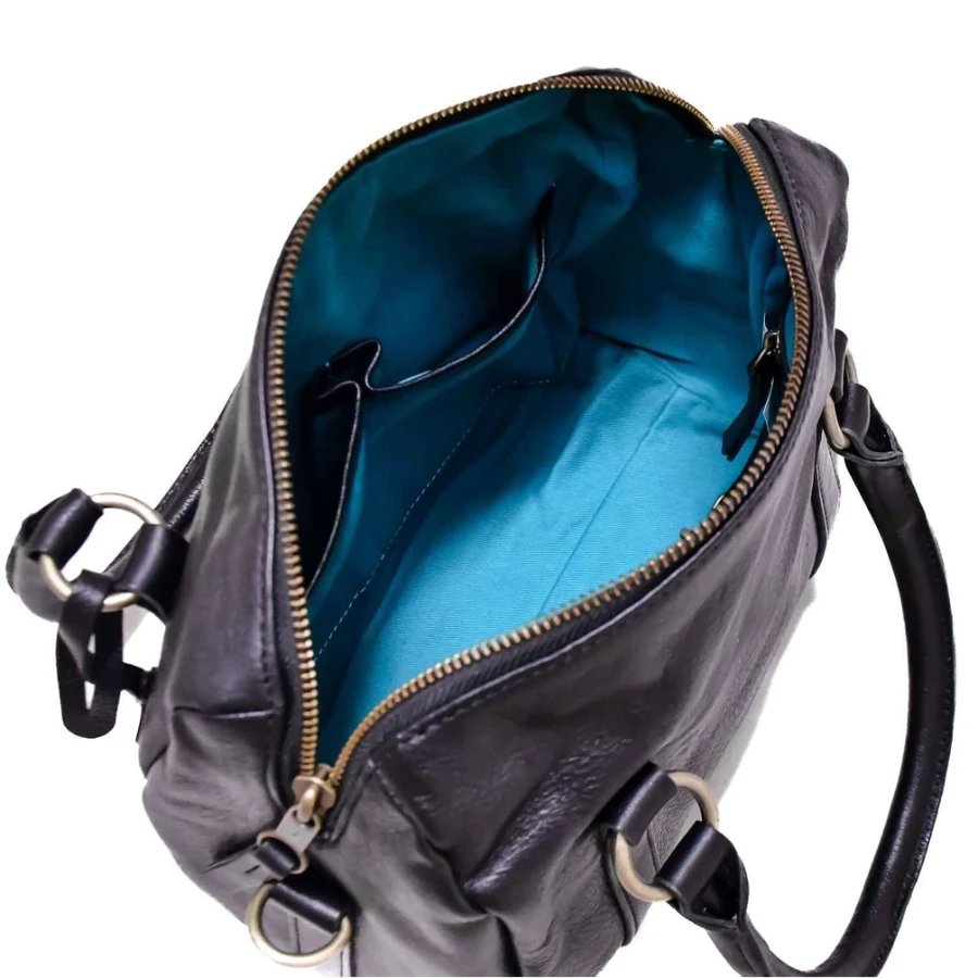 Black leather bag with blue interior on a white background