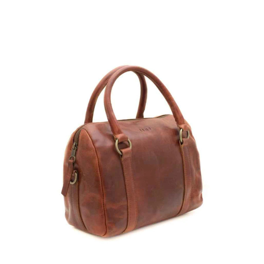 Brown leather handbag on a white background