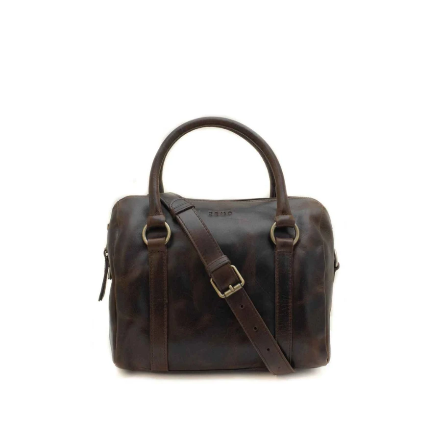 Brown leather bag with a strap on a white background