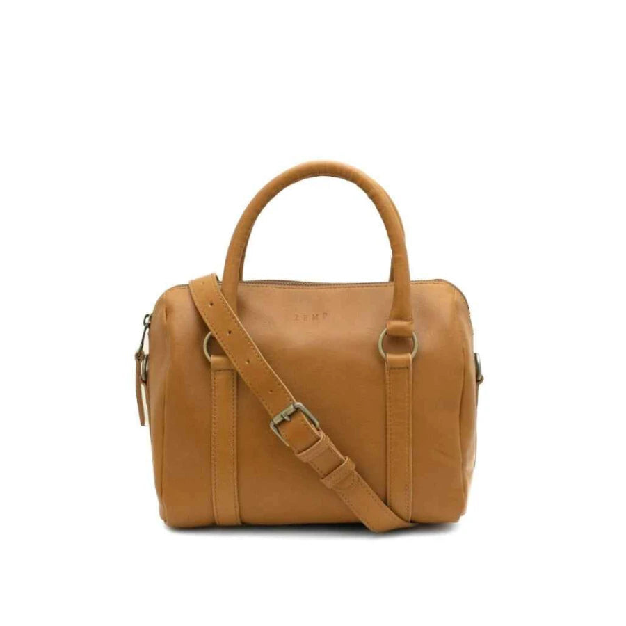 Tan leather handbag with a shoulder strap on a white background