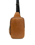Brown leather sling bag on a white background