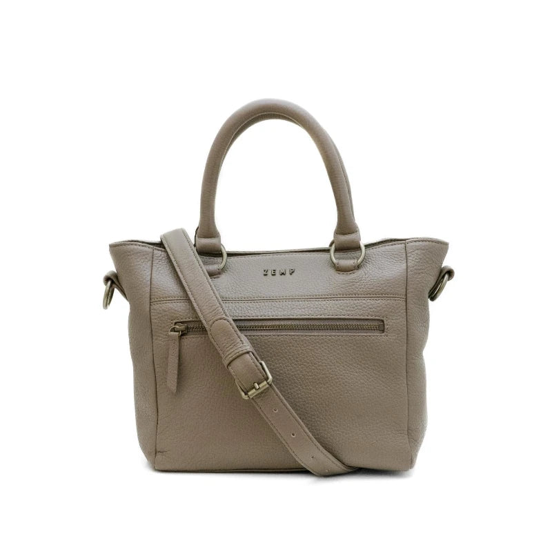 Beige handbag with a shoulder strap on a white background