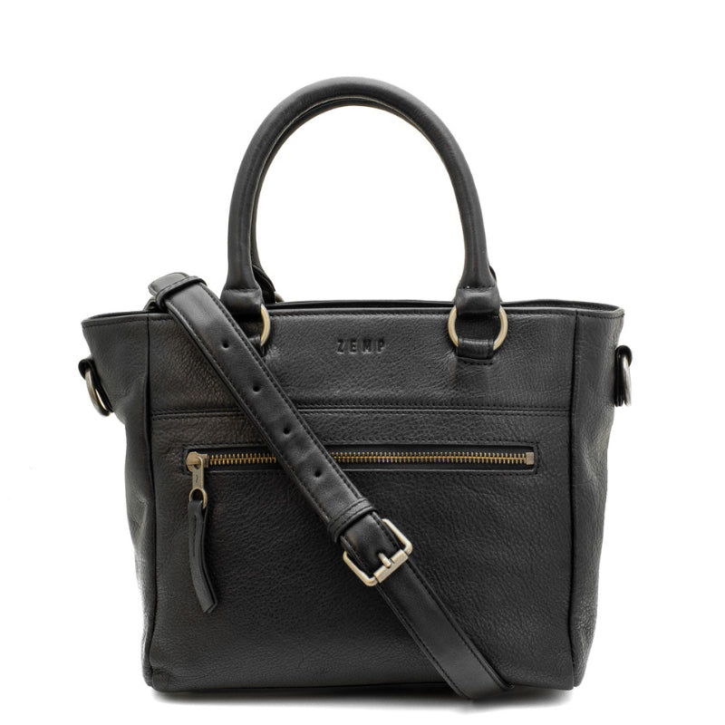 Black handbag with gold zippers and hardware on a white background