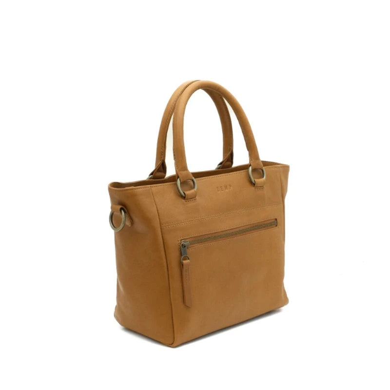 Tan leather handbag with gold accents on a white background