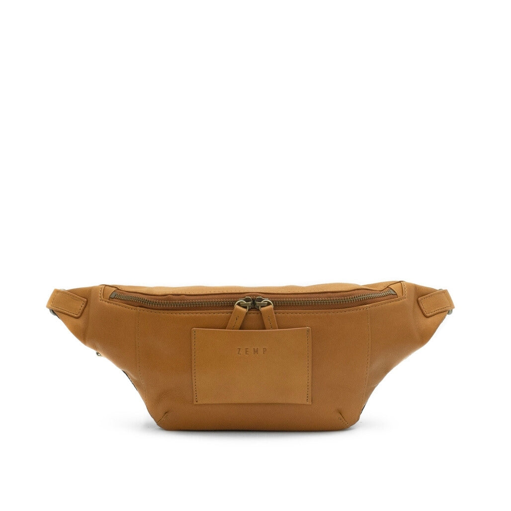Brown leather waist bag on a white background