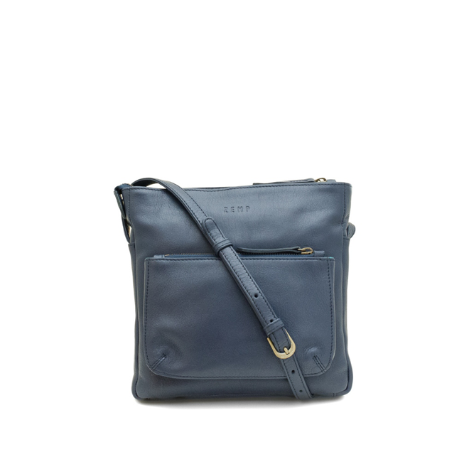Blue leather crossbody bag on a white background